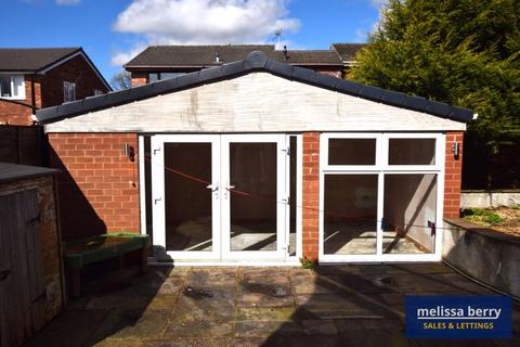 16 Harris Drive, Bury, BL9 8PS