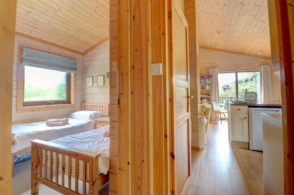 Hallway through bedroom 3 and living.jpg