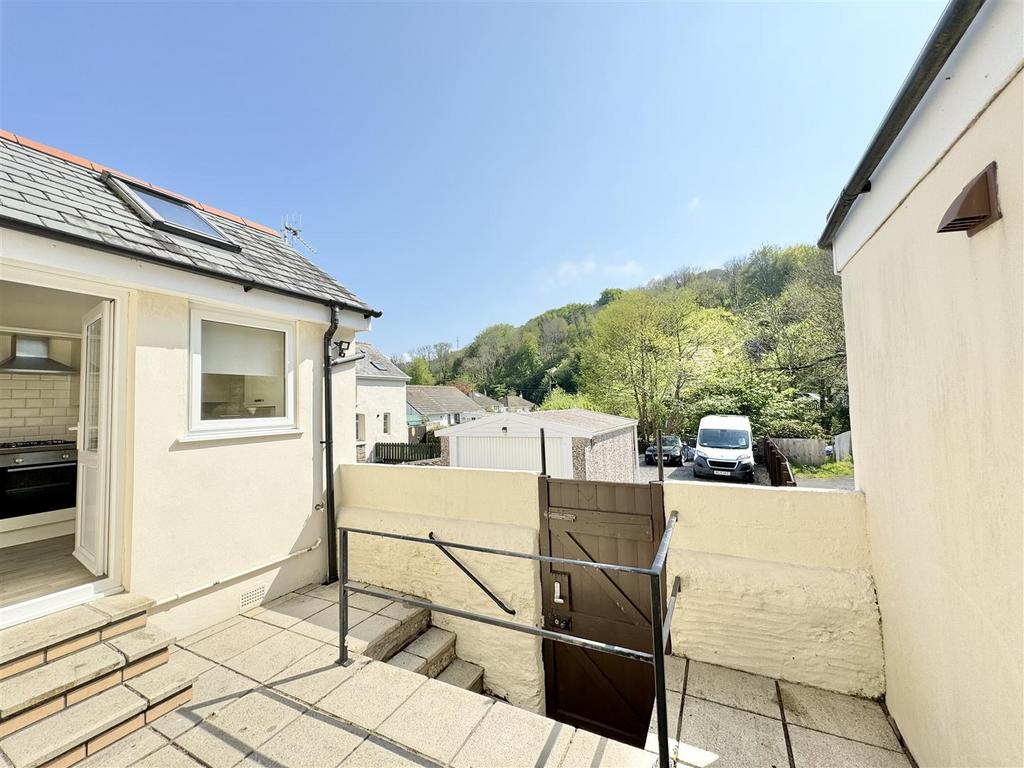 Rear terrace gate to parking area
