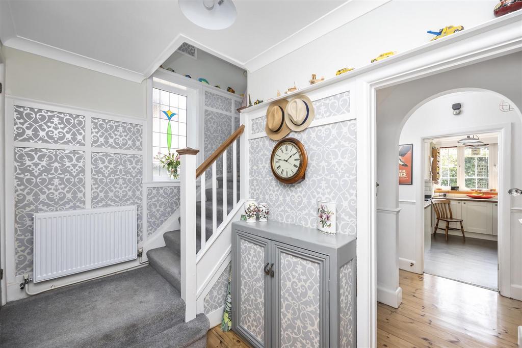 Stairs rising to First Floor