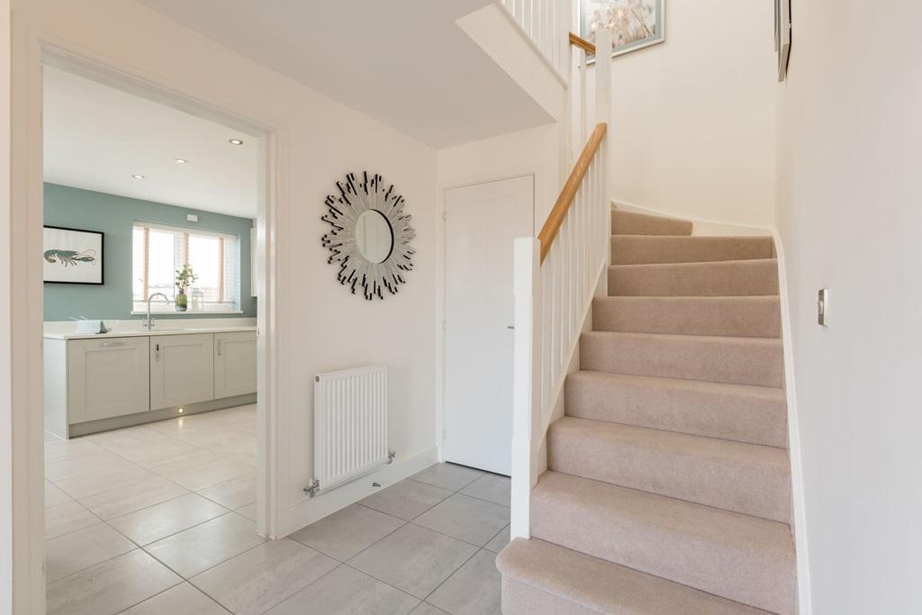 Hallway with storage cupboard