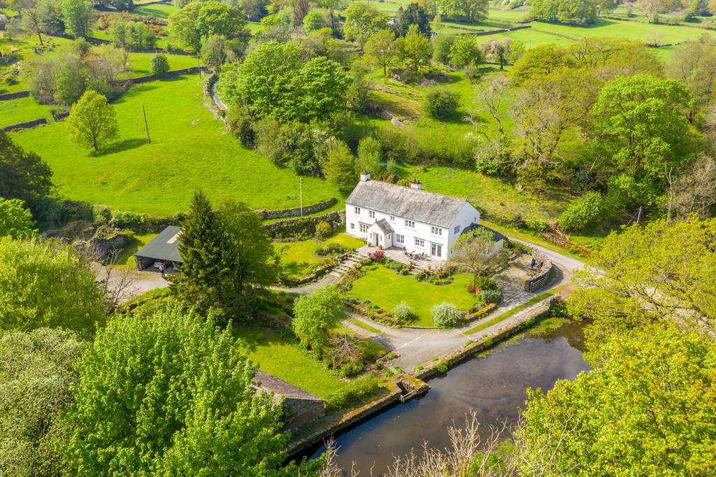 Aerial of the house, pond and land