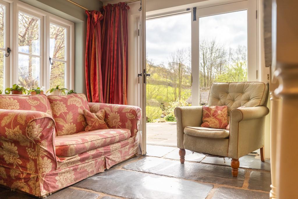 Cosy sitting area with doors to the terrace