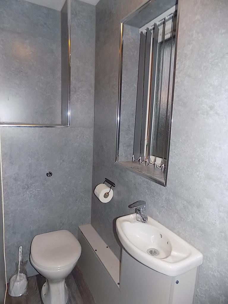 Toilet Room 1 of 2