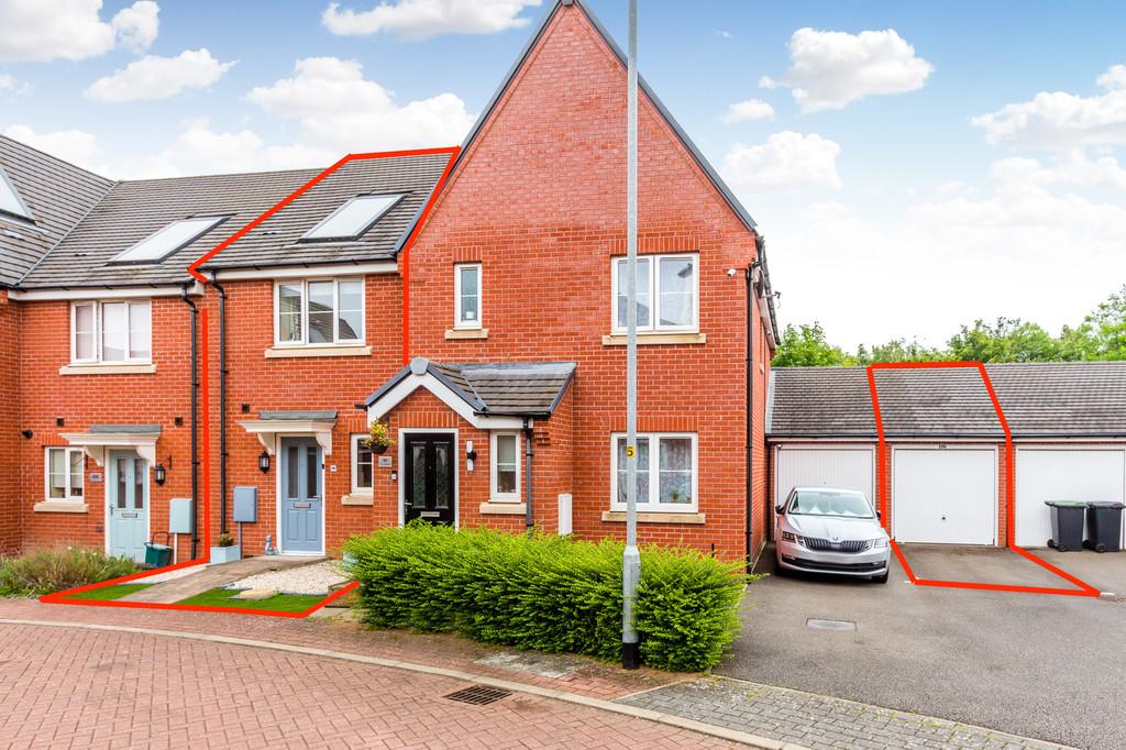 Front showing garage and property