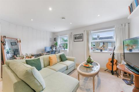 Flat 1, 29a Abbey Parade, London, SW19 1DG