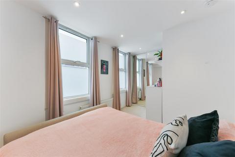 Flat 1, 29a Abbey Parade, London, SW19 1DG