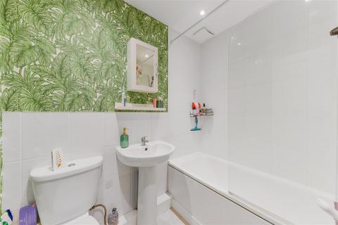 Flat 1, 29a Abbey Parade, London, SW19 1DG