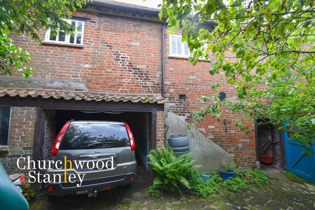 Garage and workshop (rear)