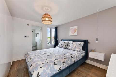 63 Burgh Heath Road, Epsom, KT17 4NF