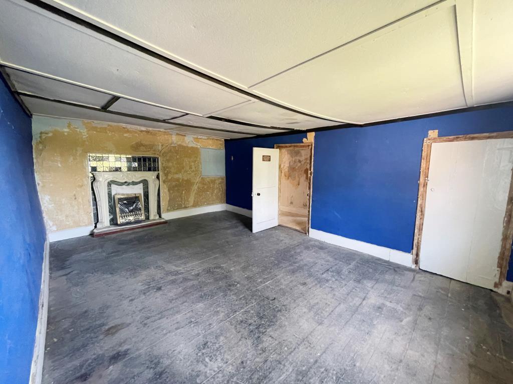First floor bedroom with fireplace