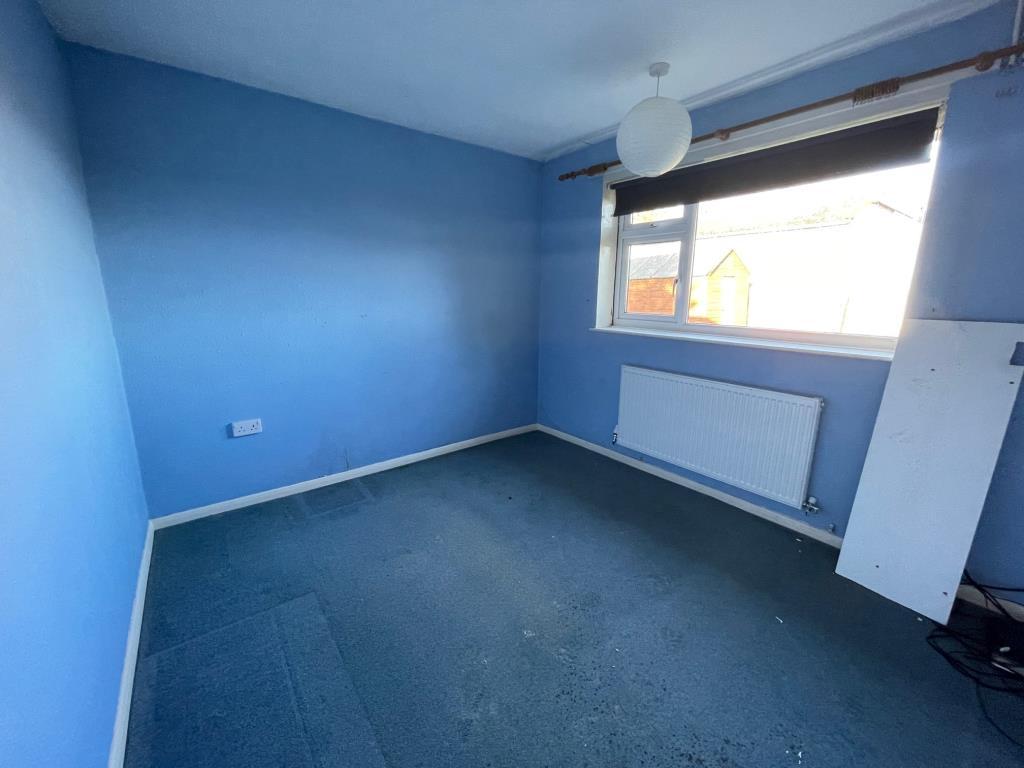 Bedroom 2 with window to the side