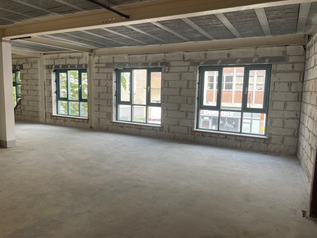 Open plan first floor area with front windows