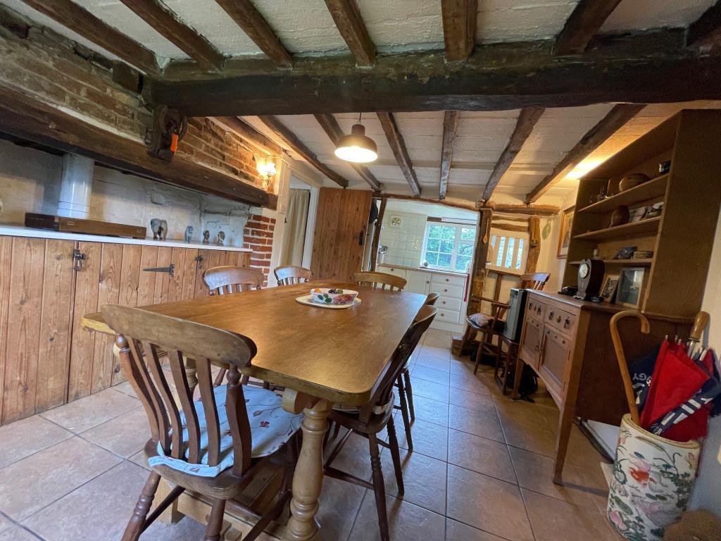 Dining Room and Kitchen with exposed beams