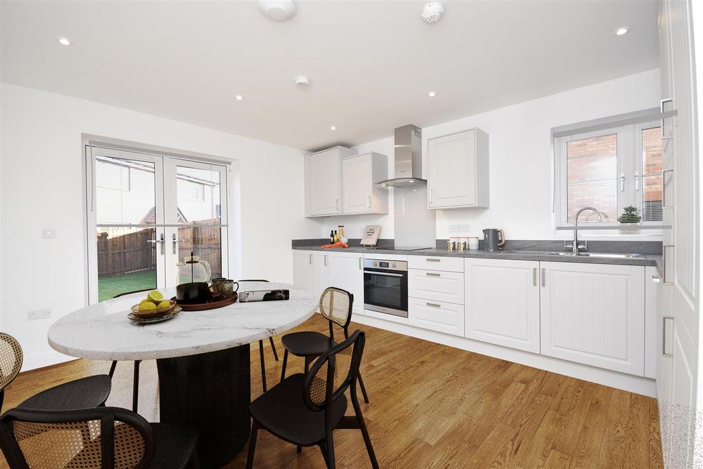 PLot 54 Kitchen with Patio Doors.JPG