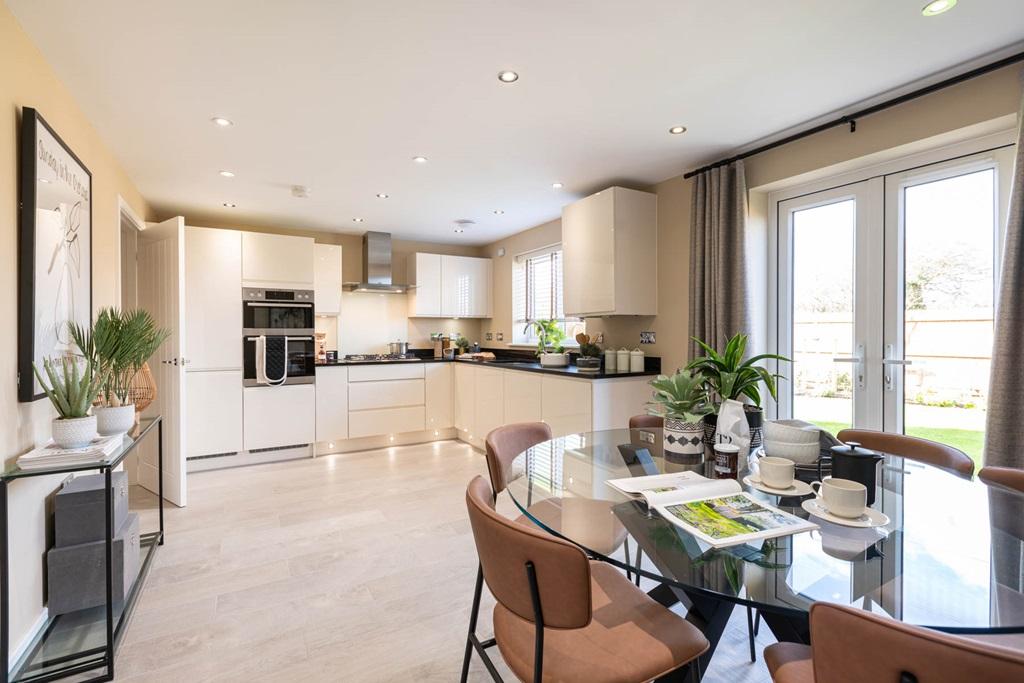 Sociable kitchen diner with doors to garden