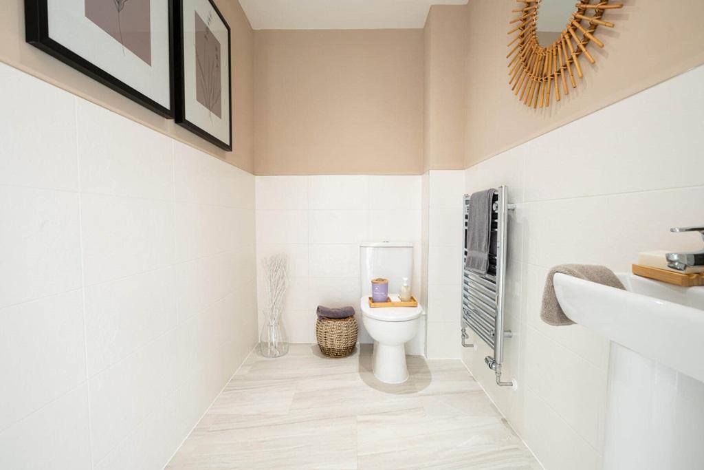 A guest cloakroom completes the ground floor