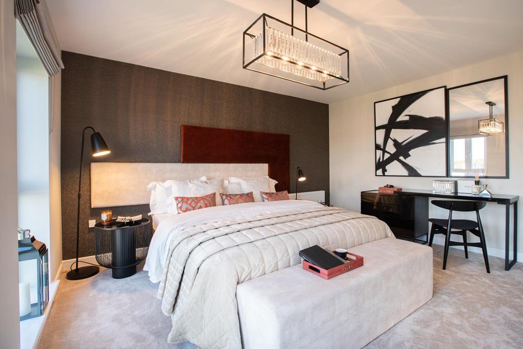 Unwind in the spacious en suite bedroom