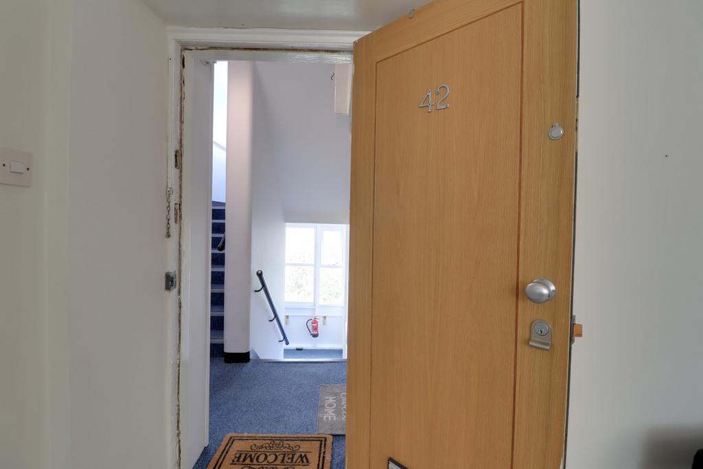 Front door and communal stairwell