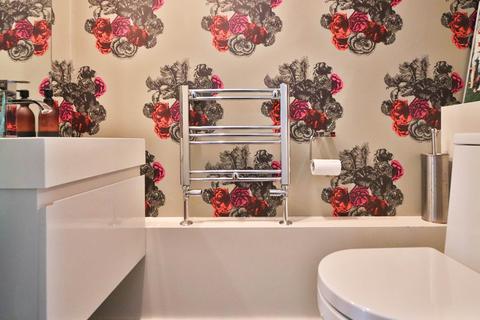 12 Pine Grove, London, SW19 7HE