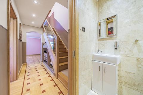 18 Freeman Road, Morden, SM4 6AR