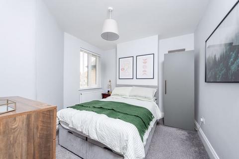 40 Kimble Road, London, SW19 2AS