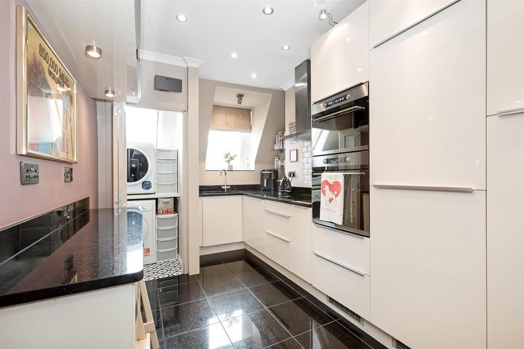 Kitchen with door to utility room