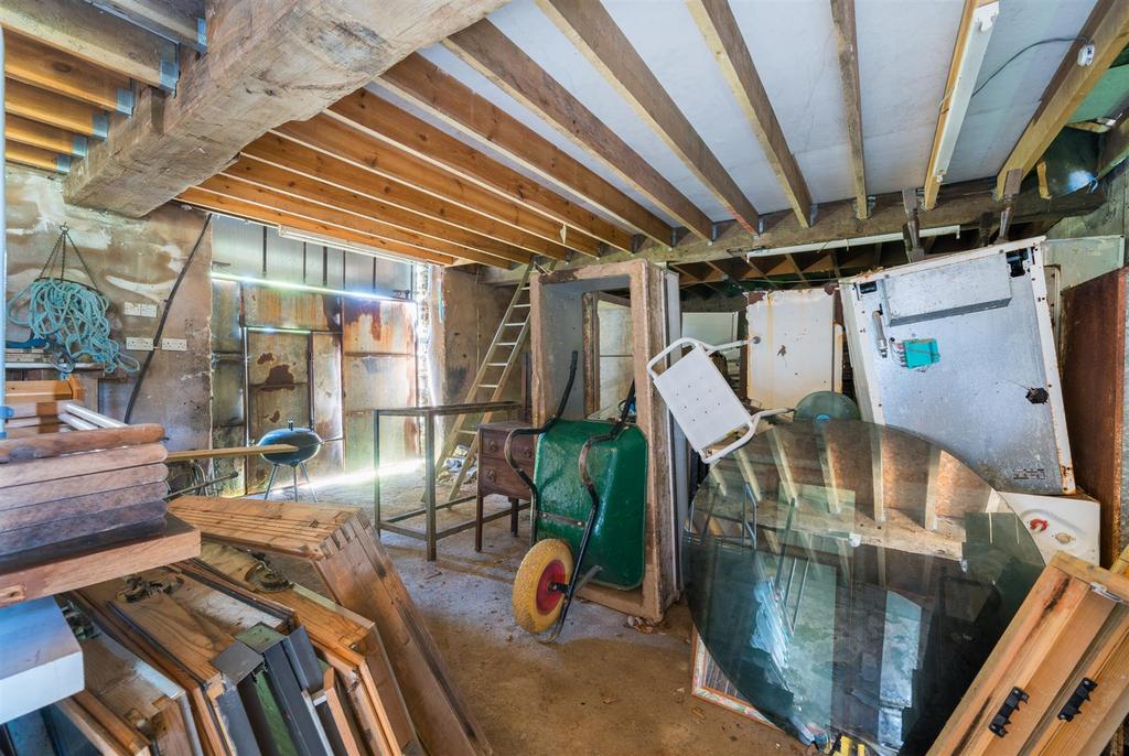 Threshing barn interior.jpg