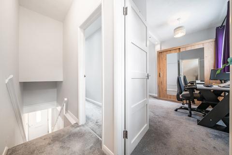 25a Dore Gardens, Morden, SM4 6QD