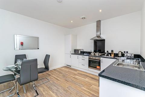 undefined, Large apartment, city road.