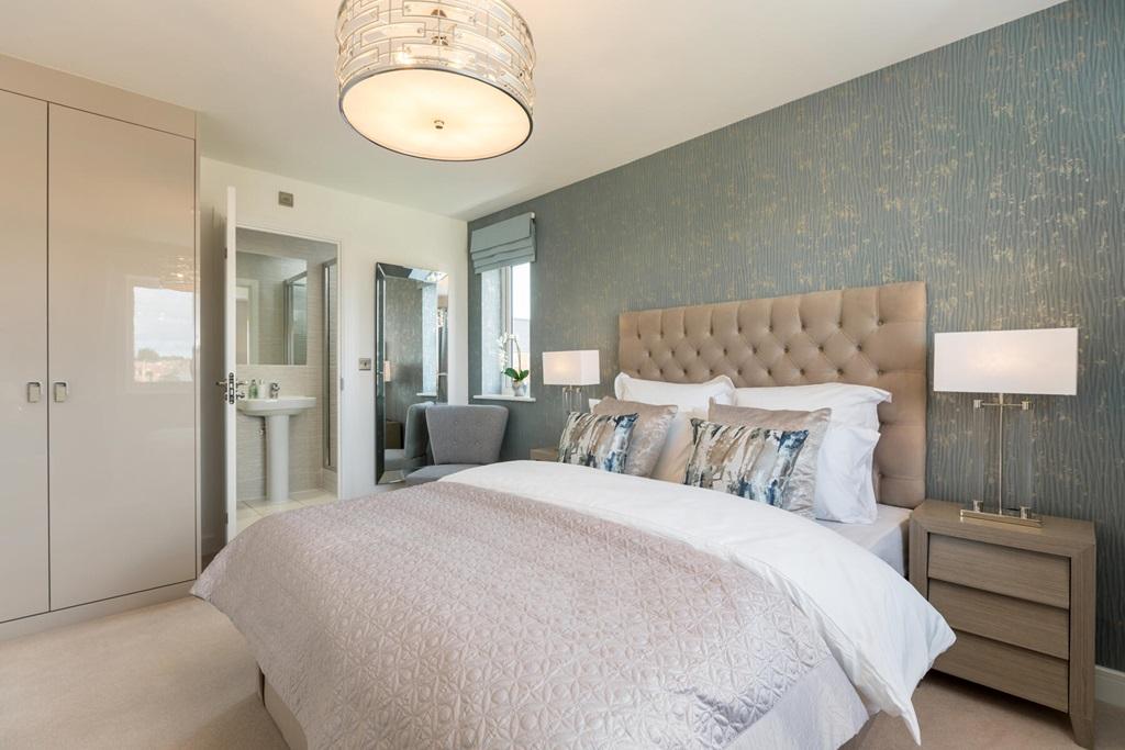 Unwind in the main bedroom with en suite