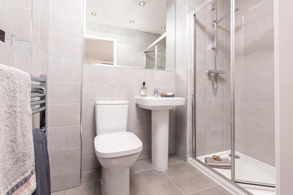 Bedroom 1 benefits from en suite shower room