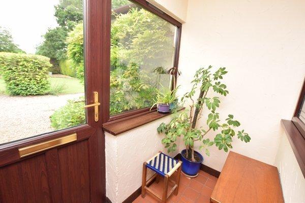 Enclosed front porch