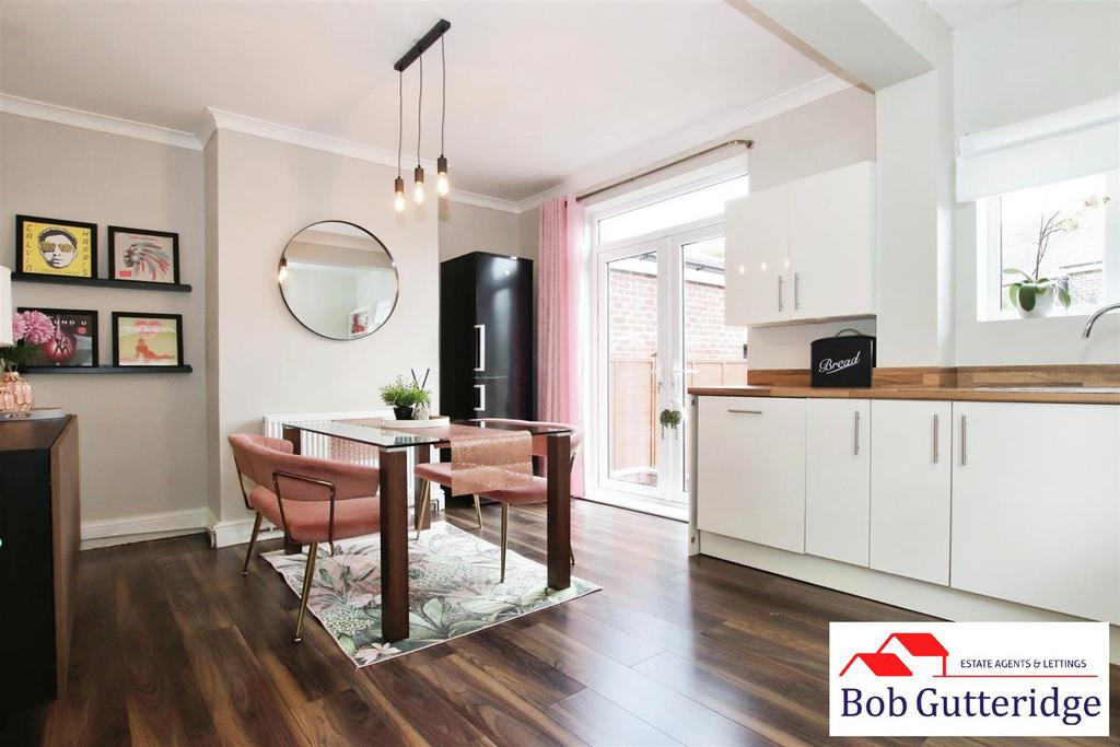 Open plan fitted kitchen / dining room