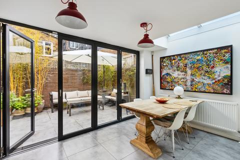 5 bedroom terraced house to rent, Kinnoul Road London W6 8NG