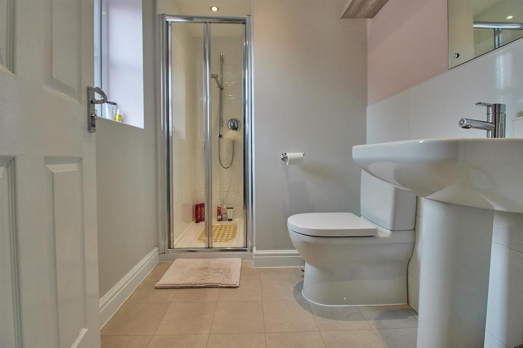 En suite shower room to rear