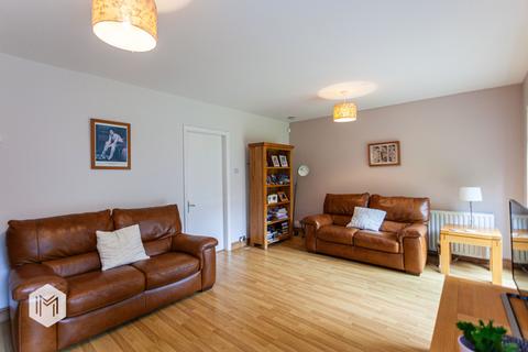 4 Beechfield Drive, Bury, BL9 9QT