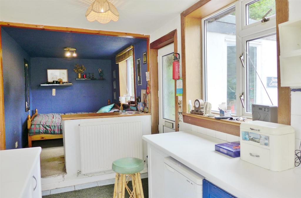 Kitchen towards bedroom area