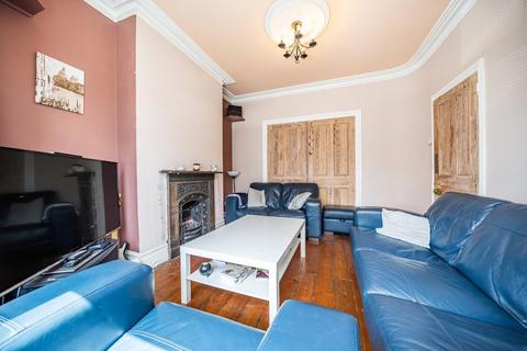 65 Quicks Road, London, SW19 1EX
