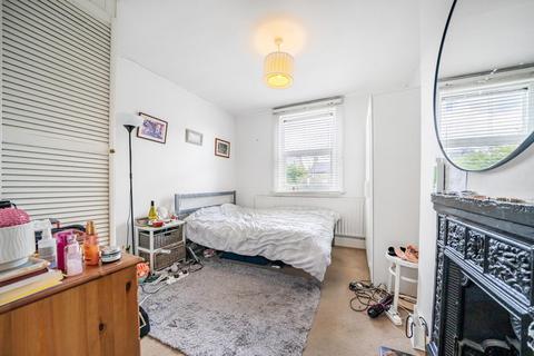 65 Quicks Road, London, SW19 1EX
