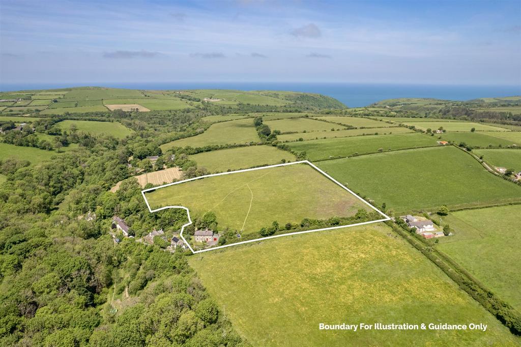 Aireal Photo of houses, land and views