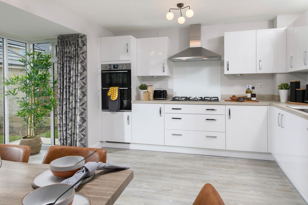 Open plan kitchen/dining area with glazed bay...