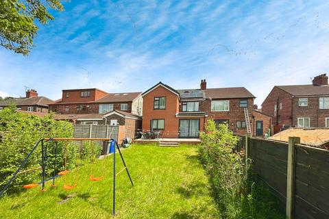 19 Corringham Road, Manchester, M19 2RG
