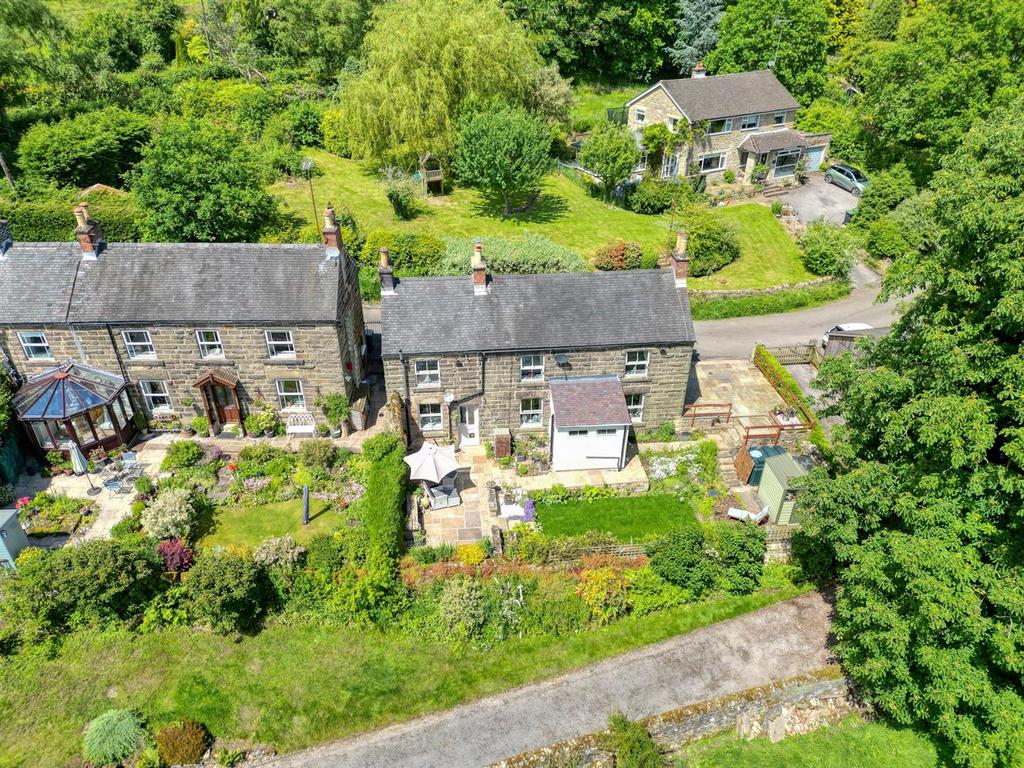Cottage, garden and parking from the air.jpg