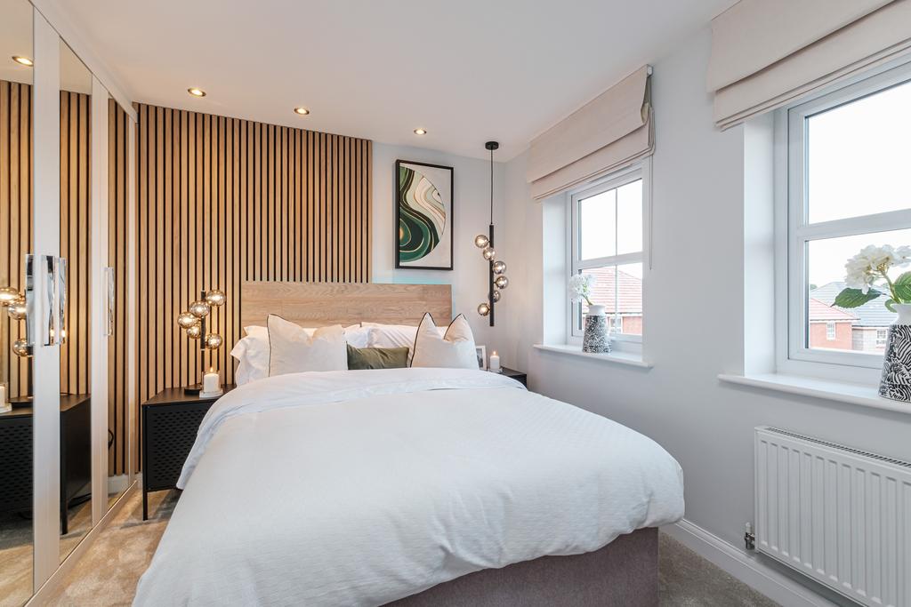 Archford wood panelled main bedroom