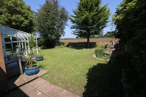 3 bedroom detached house for sale, Generous corner plot with views over fields in Cleeve