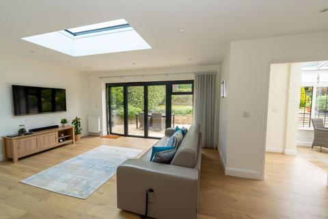 14 Esher Place Avenue, Esher, KT10 8PY