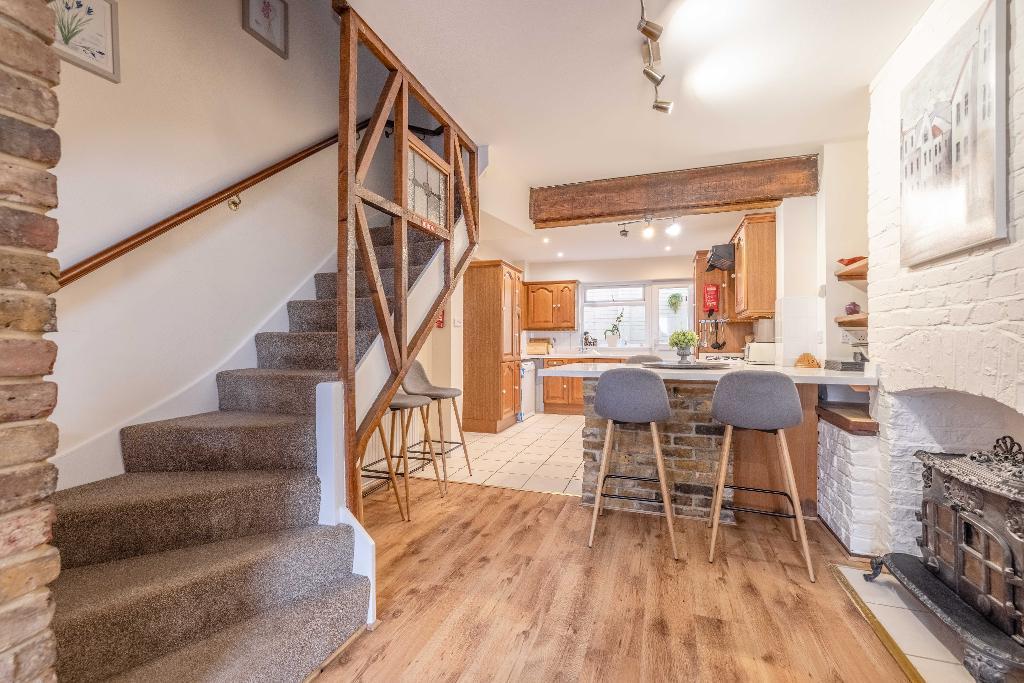 Living room opening to Kitchen