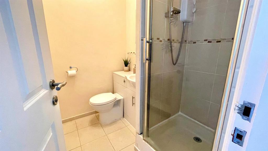 Part tiled shower room
