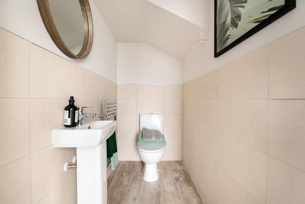 A handy downstairs cloakroom completes the...